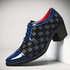 A blue and black patterned lace-up business casual shoe with a block heel.