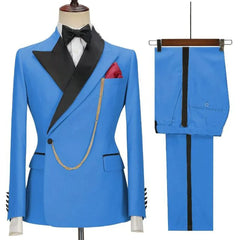 A bright blue two-piece suit with a black lapel, bow tie, and gold chain accessory.