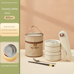 A creamy-white insulated lunch box set with two containers, a matching bag, and cutlery.