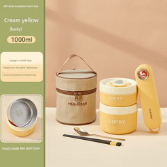 A cream yellow insulated lunch box set with a matching bag, cutlery, and stainless steel liners.