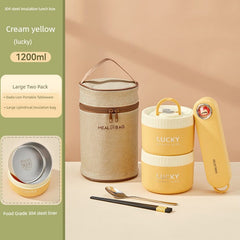 A cream yellow insulated lunch box set with two stackable containers, a carrying bag, and cutlery.