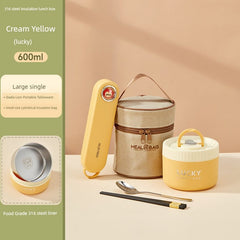 A cream yellow insulated lunch box set with a matching bag, cutlery, and a stainless steel liner.