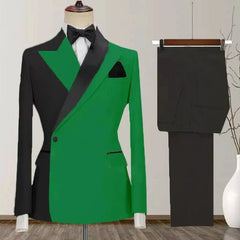 A two-piece men's suit featuring a green and black color-blocked blazer and matching black trousers.