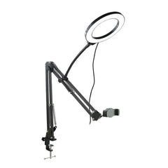 A black adjustable desk mount featuring a ring light and a smartphone holder.