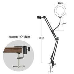 An adjustable desktop ring light stand with a clamp mount for tables up to 4.5 centimeters thick.