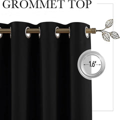 A black blackout curtain panel featuring a grommet top with a 1.6-inch inner diameter.