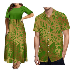 A woman in a green maxi dress and a man in a matching green and tan Polynesian print shirt.