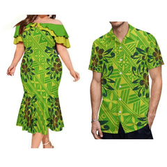 A woman in a green off-shoulder mermaid dress and a man in a matching green patterned shirt.