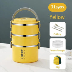 A yellow three-layer stainless steel thermal lunch box with matching cutlery, inner containers, and a bag.