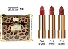 A leopard print chain bag containing three matte lipsticks in berry, blood red, and maple shades.