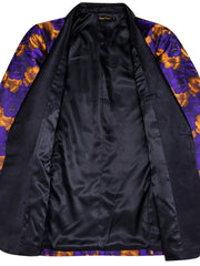 A purple and gold floral jacquard blazer with a black shawl lapel and button closure.