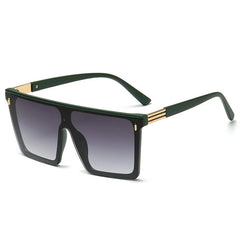 Oversized rectangular sunglasses with a dark gradient lens and green frame accents.