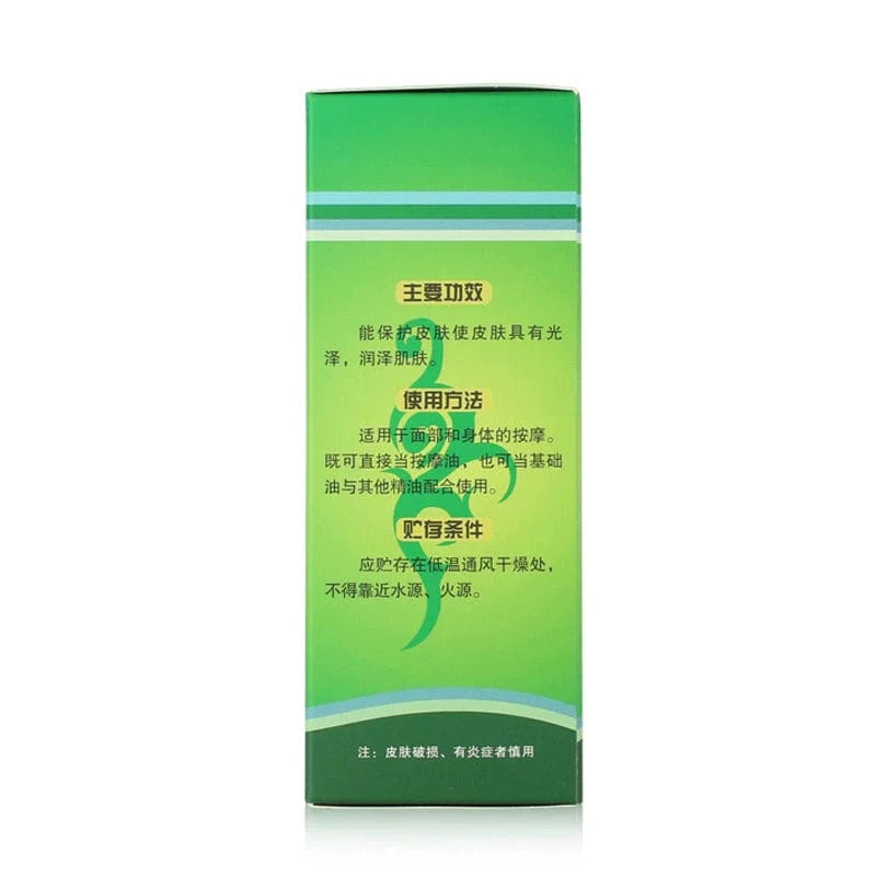 A green rectangular box of Rinawale Camellia Massage Oil with Chinese text detailing its usage.