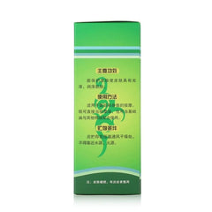 A green rectangular box of Rinawale Camellia Massage Oil with Chinese text detailing its usage.
