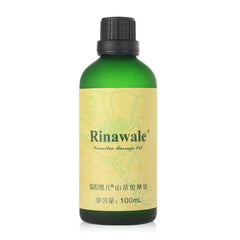 A 100ml bottle of Rinawale Camellia Massage Oil with a green glass body and a black cap.