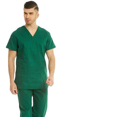 A man wearing a green V-neck short-sleeve medical scrub top and matching pants.