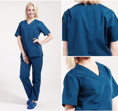 A woman wears a royal blue V-neck short-sleeve medical scrub top and matching straight-leg pants.