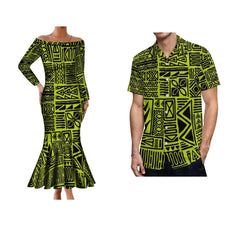 A woman in a long off-the-shoulder mermaid dress and a man in a short-sleeve shirt with matching lime green and black Polynesian tribal patterns.