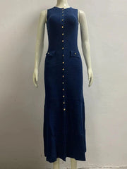 A sleeveless navy blue maxi dress with a button-down front and two small hip pockets.