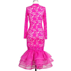 A hot pink lace mermaid dress with long sleeves and a tiered ruffled hem.