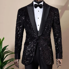 A black sequined slim-fit tuxedo blazer with a notched lapel and matching trousers.
