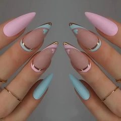 Long stiletto press-on nails featuring a mix of solid pastel colors and French tip designs.