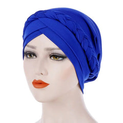 A royal blue cotton turban cap featuring a decorative braided headband detail.