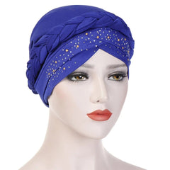 A royal blue cotton turban head scarf featuring a braided detail and scattered pearl embellishments.