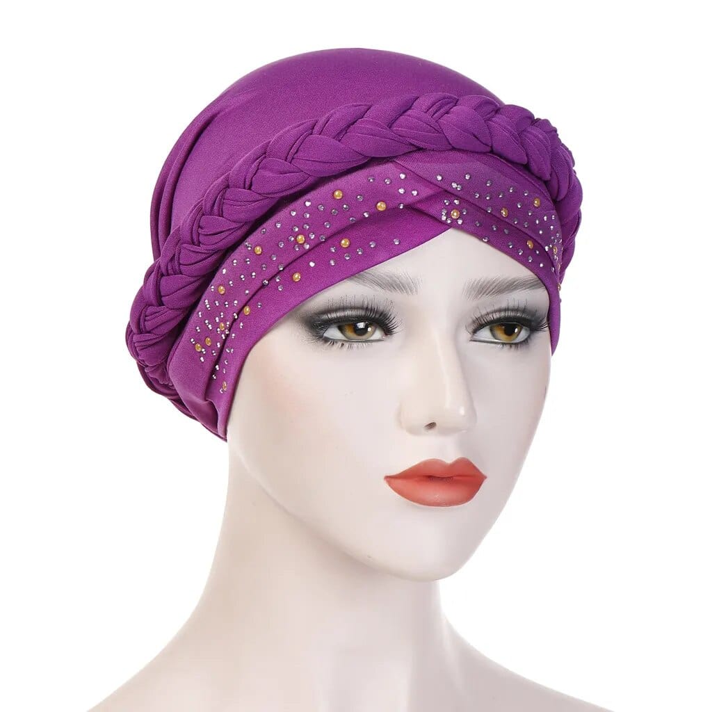 A purple cotton turban hijab featuring a braided headband detail and scattered pearl embellishments.