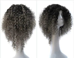 A short, curly black and grey ombre wig on a mannequin head.