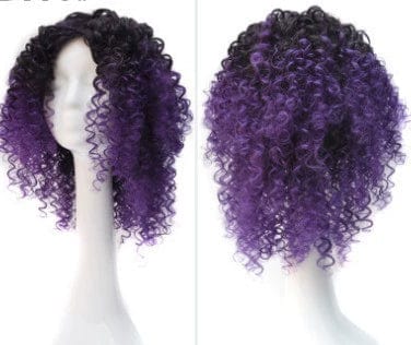 A mannequin head displays a short, curly black and purple ombre wig with voluminous texture.
