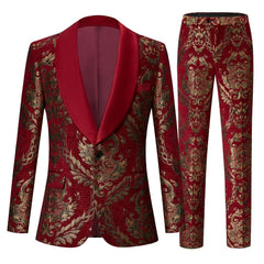 A two-piece men's suit featuring a red and gold floral brocade pattern with a shawl lapel.