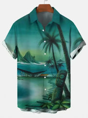 A green short-sleeved Hawaiian shirt featuring a tropical island print with palm trees and a tiki.