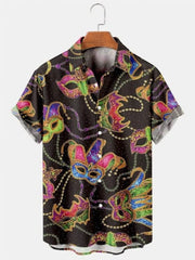 A short-sleeved button-down shirt featuring a black background with a colorful Mardi Gras mask print.