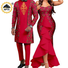 A man and woman wearing matching red and black patterned African-style outfits.