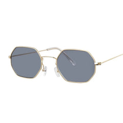 Gold-framed octagonal sunglasses with grey lenses for women.