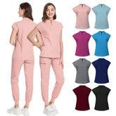 A woman models a pink scrub set with a short-sleeved top and jogger pants, shown alongside various color options.