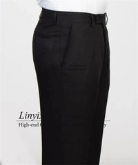 A pair of black flat-front dress trousers with a button fly closure.