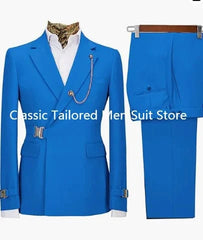 A bright blue slim-fit men's suit featuring a double-breasted blazer with buckle details.
