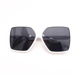Oversized square sunglasses for women featuring a white frame and dark polarized lenses.
