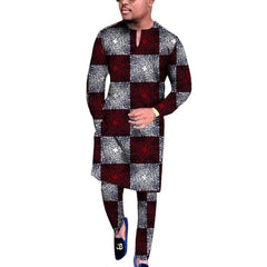 A man wears a long-sleeved V-neck shirt and matching trousers featuring a red and white checkered pattern.
