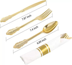 A set of gold-colored plastic cutlery including a knife, fork, and spoon with dimensions labeled.