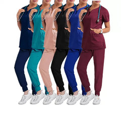 Six women wearing short-sleeve scrub sets in various colors with stethoscopes.