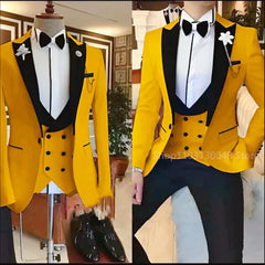 A slim-fit yellow three-piece tuxedo with a black peak lapel, vest, and trousers.