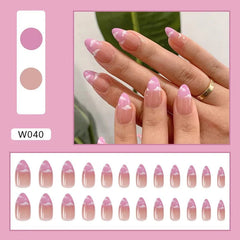 A set of twenty-four almond-shaped press-on nails featuring a purple gradient and cloud design.