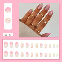 A set of twenty-four almond-shaped press-on nails featuring pink French tips and wavy accents.