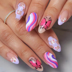 Almond-shaped press-on nails featuring pink butterfly, checkered, and wavy colorful designs.