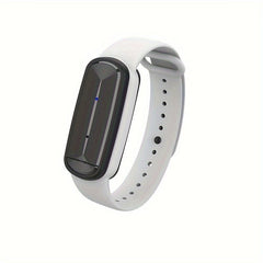 A white silicone mosquito repellent wristband with a black, oval-shaped ultrasonic device.