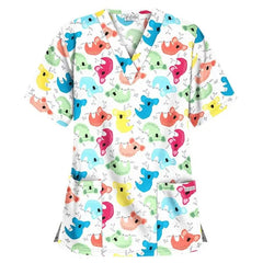 A V-neck scrub top featuring a colorful koala print on a white background with two front pockets.