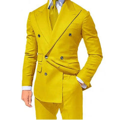 A man wears a vibrant yellow double-breasted suit jacket with matching trousers.